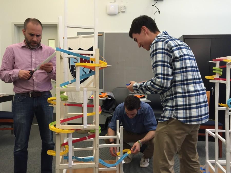 Mr.+Woodard+closely+inspects+a+part+of+Stephen+Everests+roller+coaster.