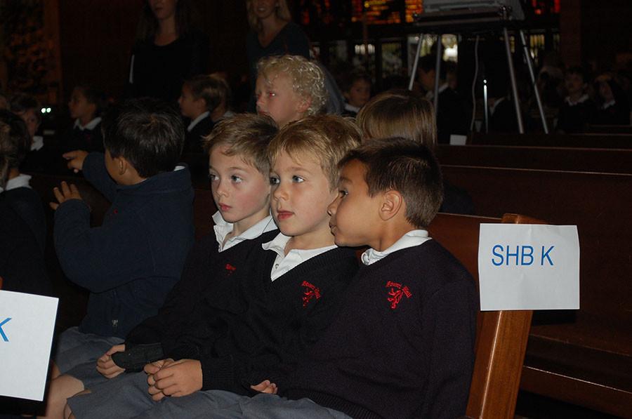 Stuart Hall for Boys students wait for the mass to start.