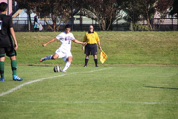 Emilio Lopez 17 clears the ball in a game last week. The Knights have few games left to move into playoff contention as the regular season comes to a close at the end of October.