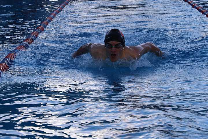 Jack Merrigan ’17 finishes an event at a recent swim meet. The Knights lost to Bentley and Drew by scores of 94-49 and 68-62, respectively.
