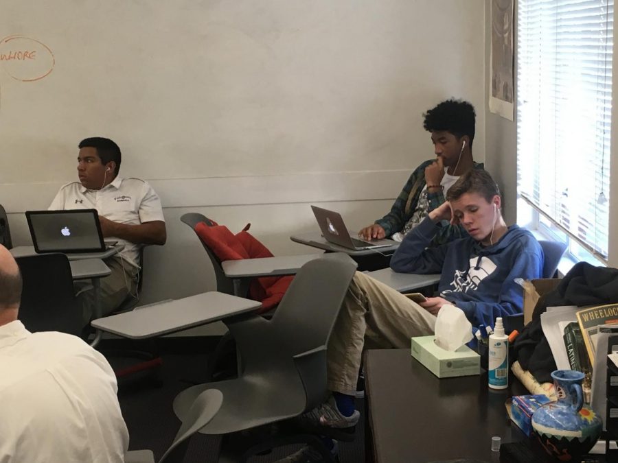 Seniors relax during free time in class. With college applications completed, seniors have more free time.