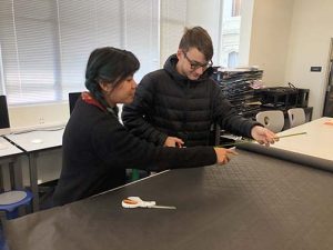Art teacher Malisa Suchanya helps senior Xander Nuñez with a crafts project in the Art Studio. The art faculty informed students of the apprenticeship with Crucible instructor Brian Enright to encourage applied skills learning outside the classroom.