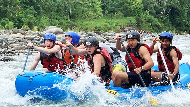 Will Burns, Will Yancey, James O’Leary, Toby Slater and Connor Caba paddle through a rapid with their guide. Sophomores descended to the river in a 30-minute shuttle ride before getting in rafts.
