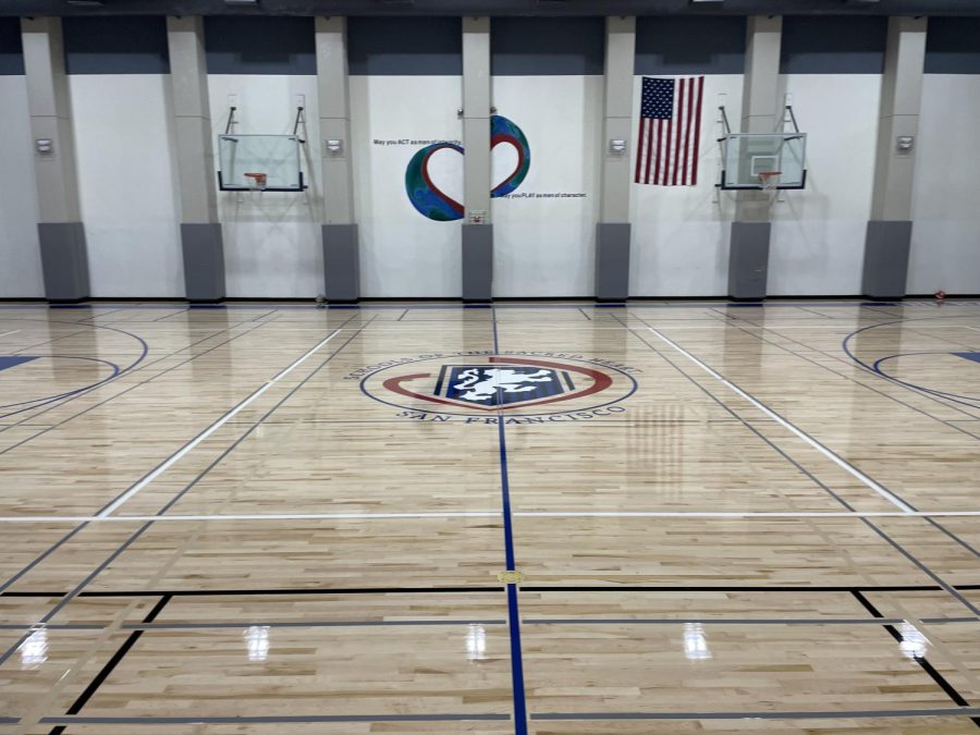 Four division Convent & Stuart Hall logo occupies the center of The Dungeon floor in place of the Stuart Hall High School shield. The school repainted the floor in addition to making maintenance changes and updates during the summer break.  