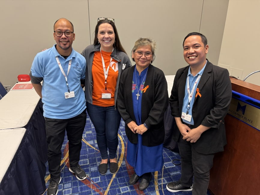 Sister Lydia Collado, RSCJ (center)