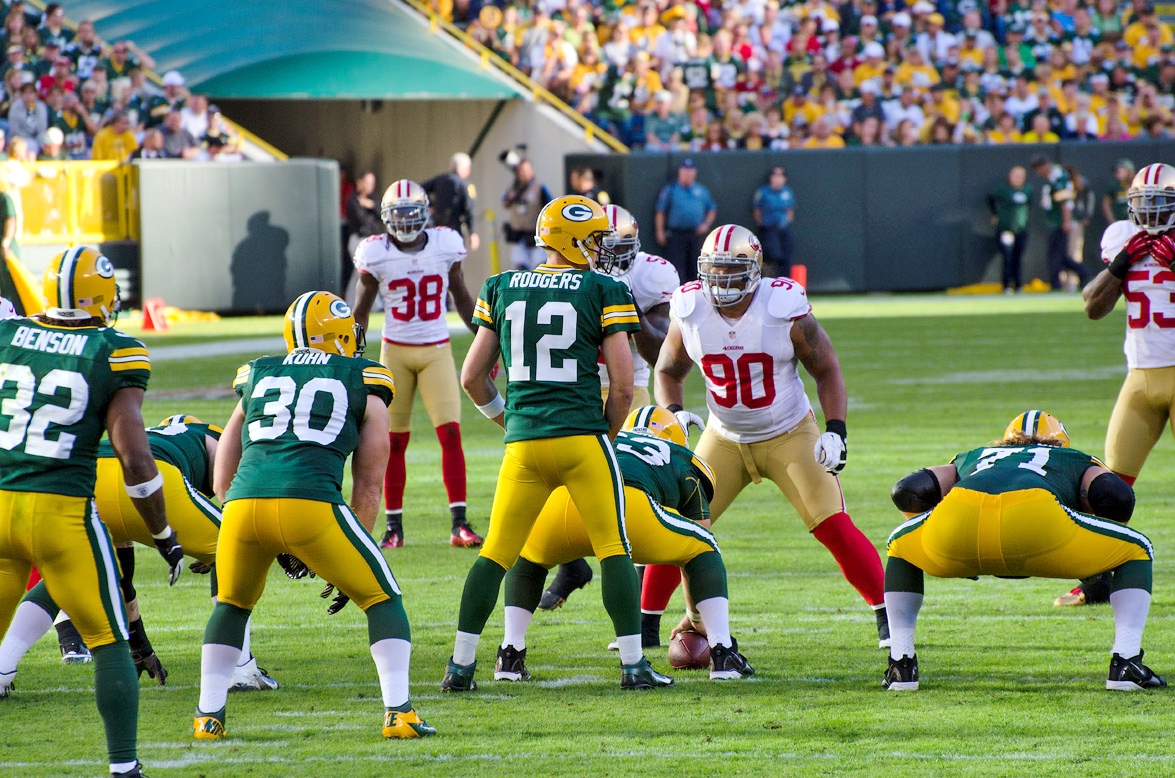 BrokenSphere. Packers Offense vs 49ers Defense 2012. 2012. Wikimedia Commons, https://commons.wikimedia.org/wiki/File:Packers_offense_vs_49ers_defense_2012.jpg. Accessed 23 Nov. 2024.