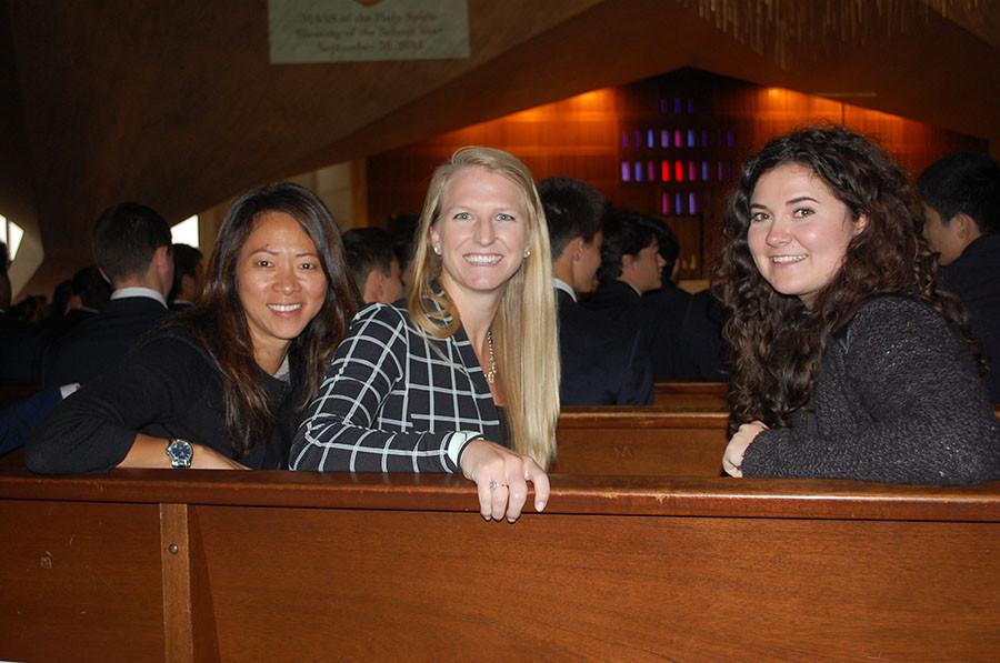 Ms. Chuakay, Ms. Peterson, and Ms. MacGarva pose for a photo while waiting for the mass to commence.