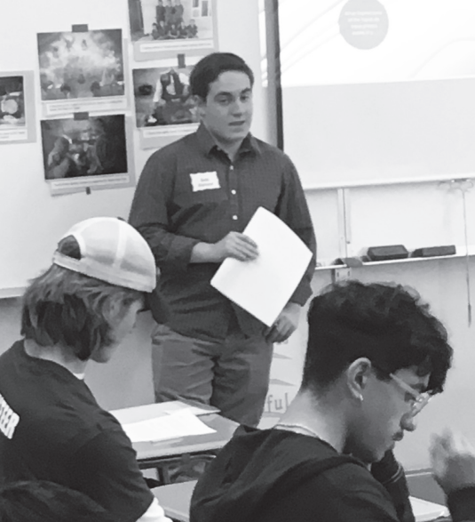 Seth Eislund '18 instructs a session during the March 4 Day of Learning event at Galileo High School. Eislund began his studies on the topic of the Yazidi Genocide through his International Baccalaureate Extended Essay.