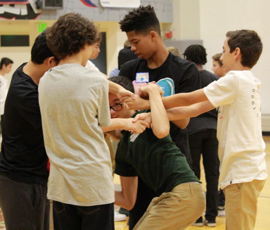 Ninth graders play a game of human knot during Freshman Success Aug. 15. Orientation took place on both campuses over a period of two days and also served as a social opportunity