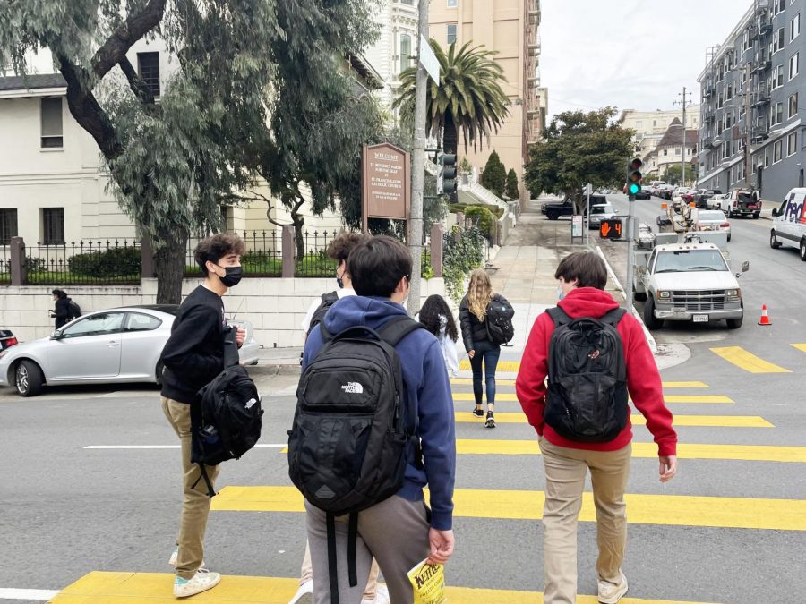 Sophomore Lev Cohen and juniors Will White and Ben Rinehart walk past the St. Benedict Parish for the Deaf on their way to the Broadway campus. Stuart Hall students and faculty primarily on the Pine/Octavia campus used to gather in the parish every other week for Chapel, but gatherings have been occurring virtually since March 2020.