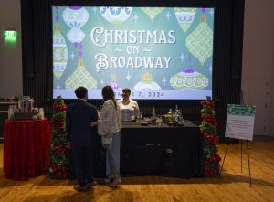 Parents enjoy refreshments in the little theater at Christmas on Broadway. The event hosted parents, alumni, and faculty alike - all coming together as a single community.