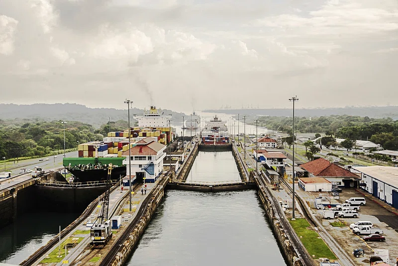 Aerial view of the Panama Canal. Construction began in 1904 under President Theodore Roosevelt and was completed in 1914, giving the U.S. military and economic advantages. The canal was handed over to Panama on December 31, 1999, just before the new millennium.