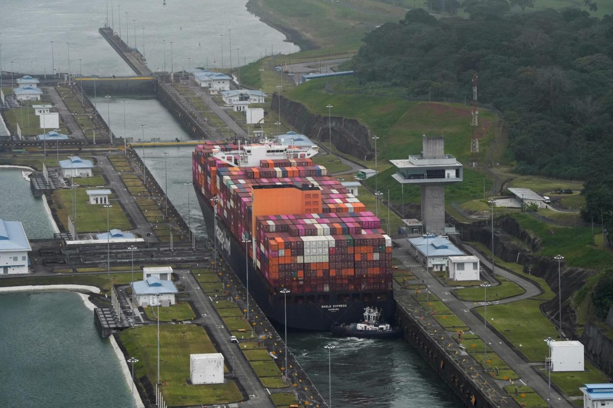 An aerial view shows a cargo vessel transits through the Cocoli Locks at the Panama Canal, in Panama City, Panama, February 1, 2025.