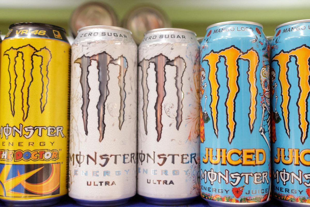 Cans of Monster Energy Drink are displayed on a shelf in a supermarket October 29, 2024.