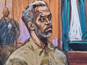 Sean "Diddy" Combs stands as he is arraigned on a superseding indictment ahead of his May trial on sex trafficking charges, in New York, U.S., March 14, 2025, in this courtroom sketch. REUTERS/Jane Rosenberg?