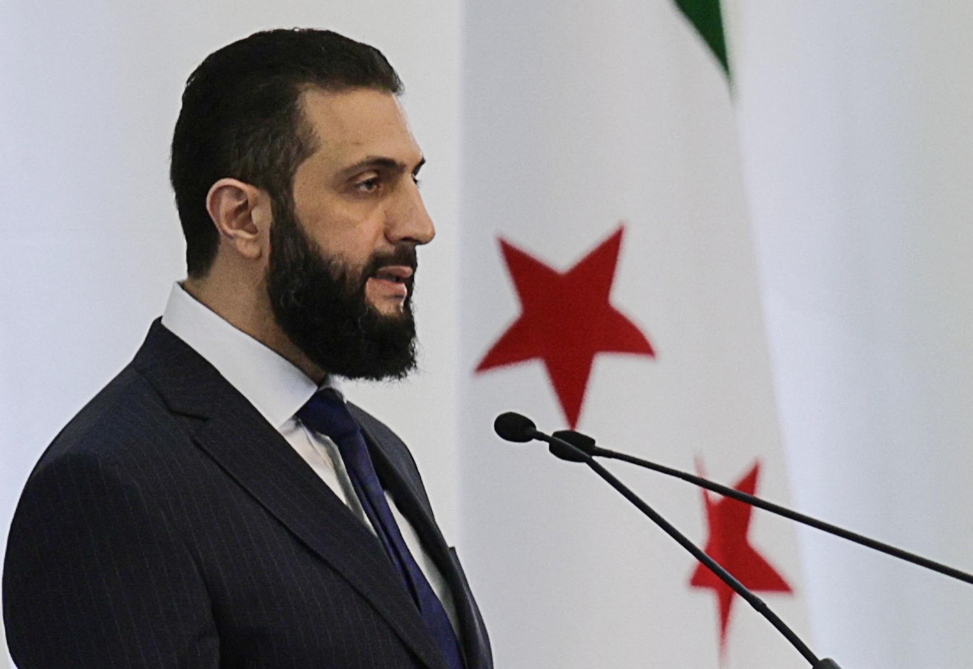 Syria's interim President Ahmed al-Sharaa speaks during a Ministerial formation of the government of the Syrian Arab Republic, in Damascus, Syria March 29, 2025. REUTERS/Khalil Ashawi