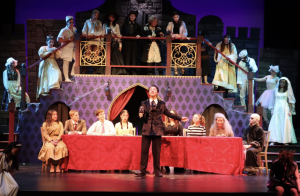 Senior Danny Loy Playing stands center stage, playing Gomez Addams last year when Convent and Stuart Hall put on a production of The Addams Family. 