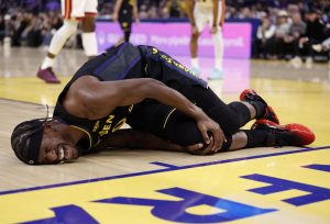 Jan 19, 2026; San Francisco, California, USA; Golden State Warriors forward Jimmy Butler III (10) holds his right knee as he goes down with an injury during the third quarter against the Miami Heat at Chase Center. Mandatory Credit: Kelley L Cox-Imagn Images
