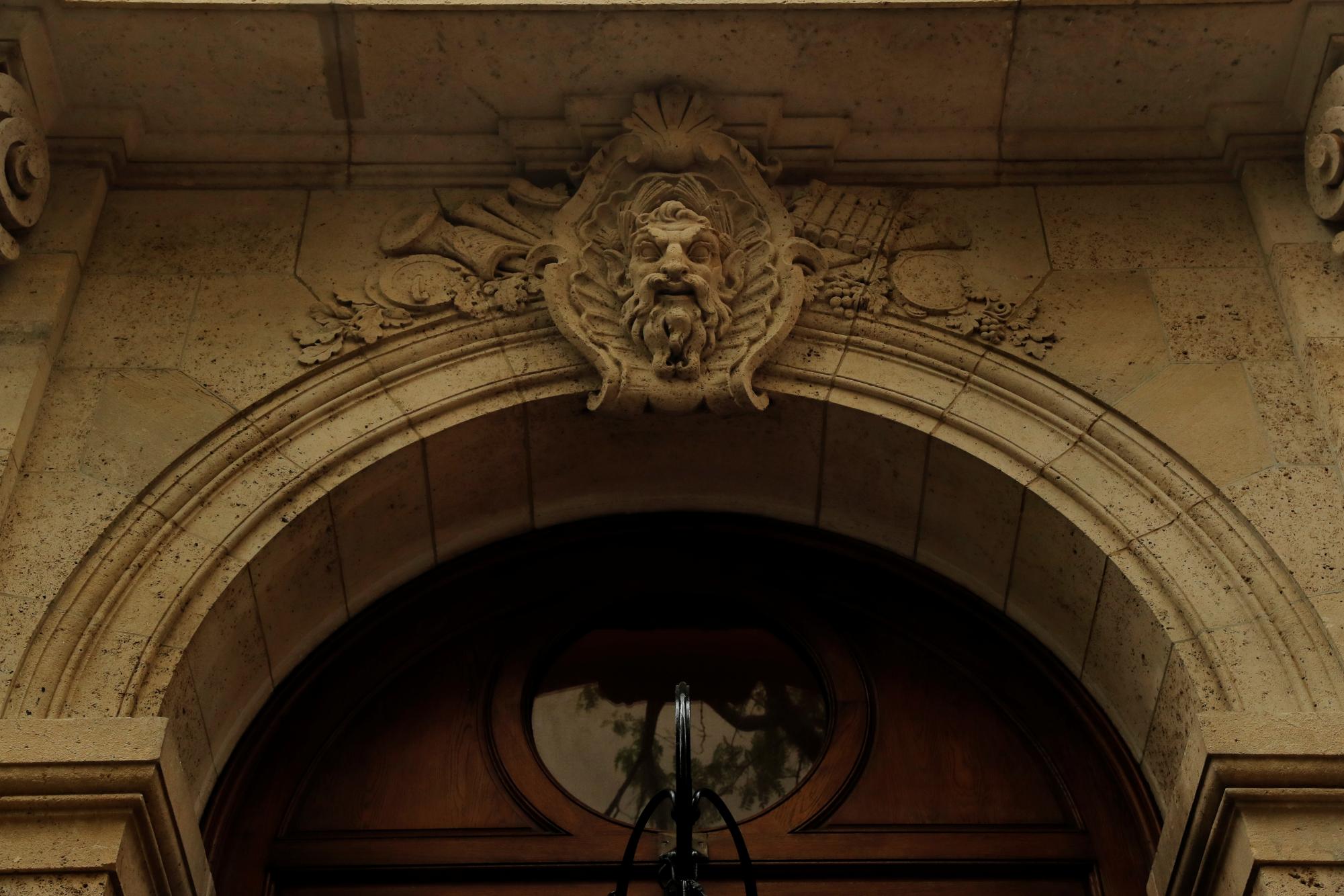 Carved faces adorn the facade of Jeffrey Epstein's home in the Manhattan borough of New York City, New York, U.S., July 18, 2019. REUTERS/Lucas Jackson