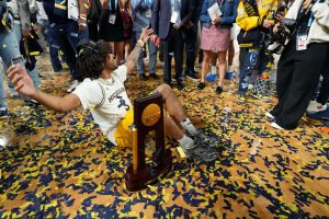 Apr 6, 2026; Indianapolis, IN, USA; Michigan Wolverines guard Elliot Cadeau (3) celebrates after their win against the UConn Huskies in the national championship of the Final Four of the men's 2026 NCAA Tournament between the and the Michigan Wolverines at Lucas Oil Stadium. Mandatory Credit: Bob Donnan-Imagn Images